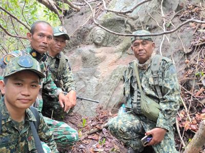 Officials from Thailand&#39;s Department of National Parks, Wildlife and Plant Conservation were sent to investigate the carving.