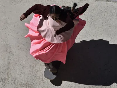 A member of the Indigenous Bolivian women&#39;s skateboard collective Imilla Skate in La Paz on June 16, 2022.