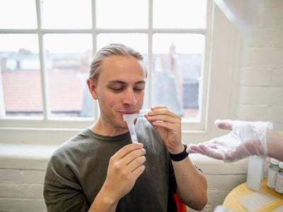 To collect a saliva sample, technicians instruct a person to tilt their head for two to five minutes and spit the accumulated saliva into a sterile tube. The saliva-filled tube is kept on ice and sent to the laboratory to test for the presence of biomarkers for cancer or other diseases.