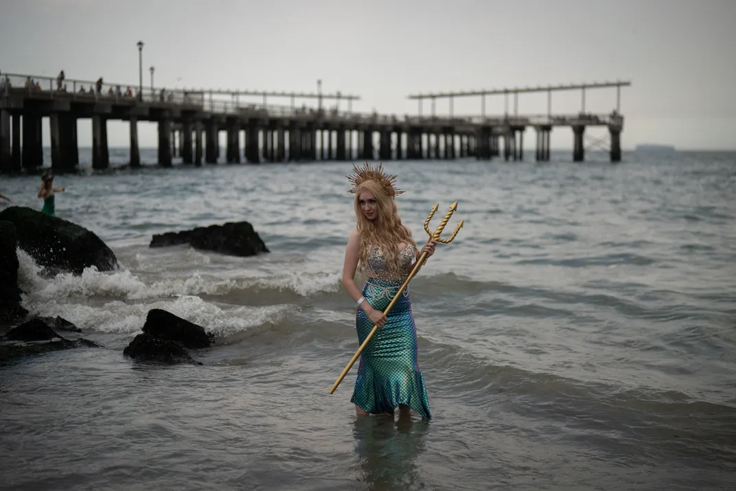 Mermaid standing in water