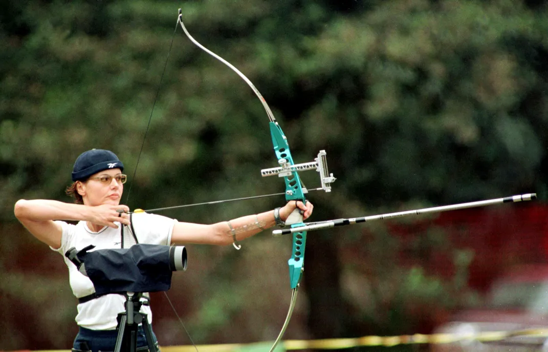 Davis prepares to fire an arrow at the U.S.'s archery Olympic trials in 1999.