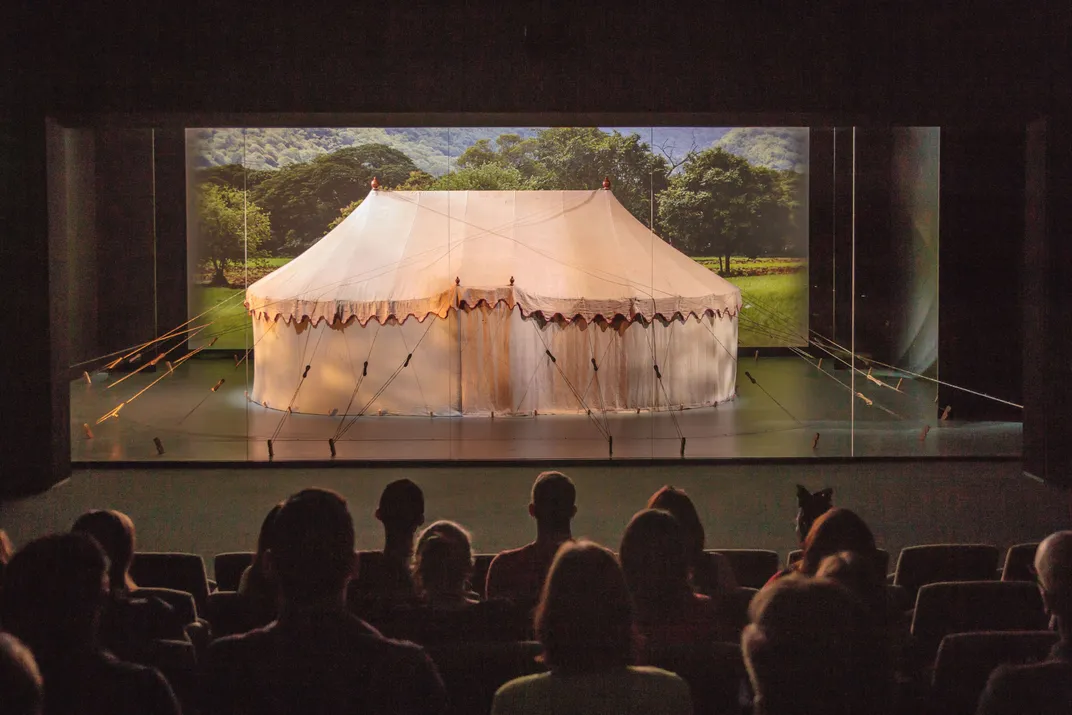 Large canvas tent in the middle of a stage