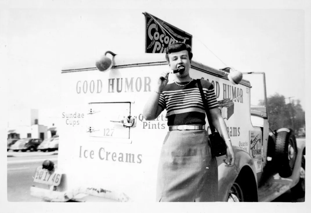 A circa 1940s photo of Eyde eating an ice cream bar