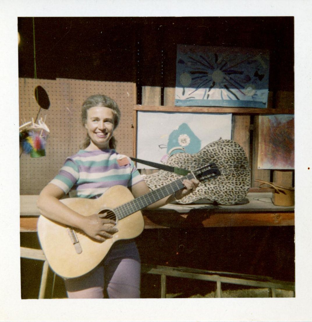 Eyde playing the guitar, circa 1960s