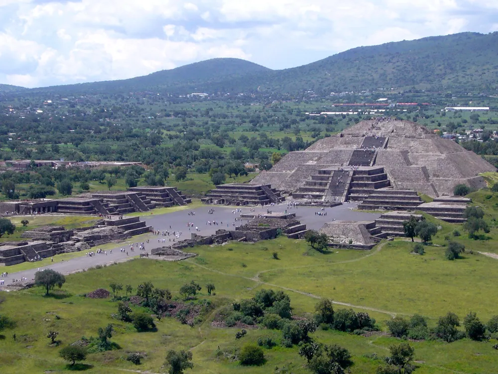 Overhead view of the Pyramid of the Moon in a green landscape