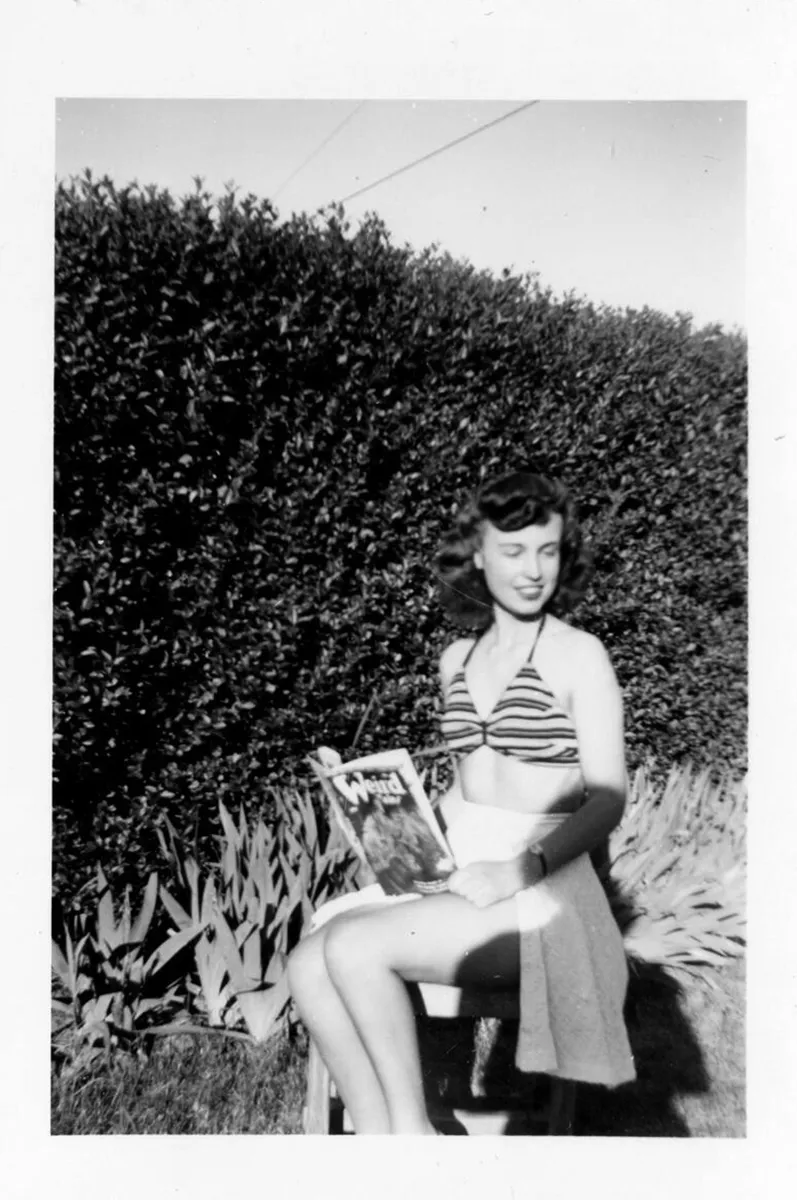 A 1945 photo of Eyde reading outside