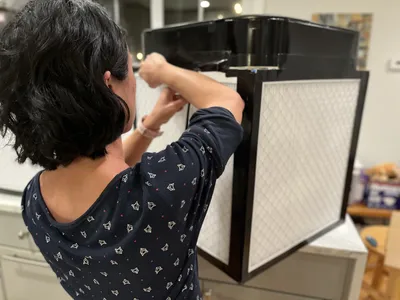 Building a Corsi-Rosenthal box portable air filter comes down to duct-taping together a set of furnace filters and a box fan.